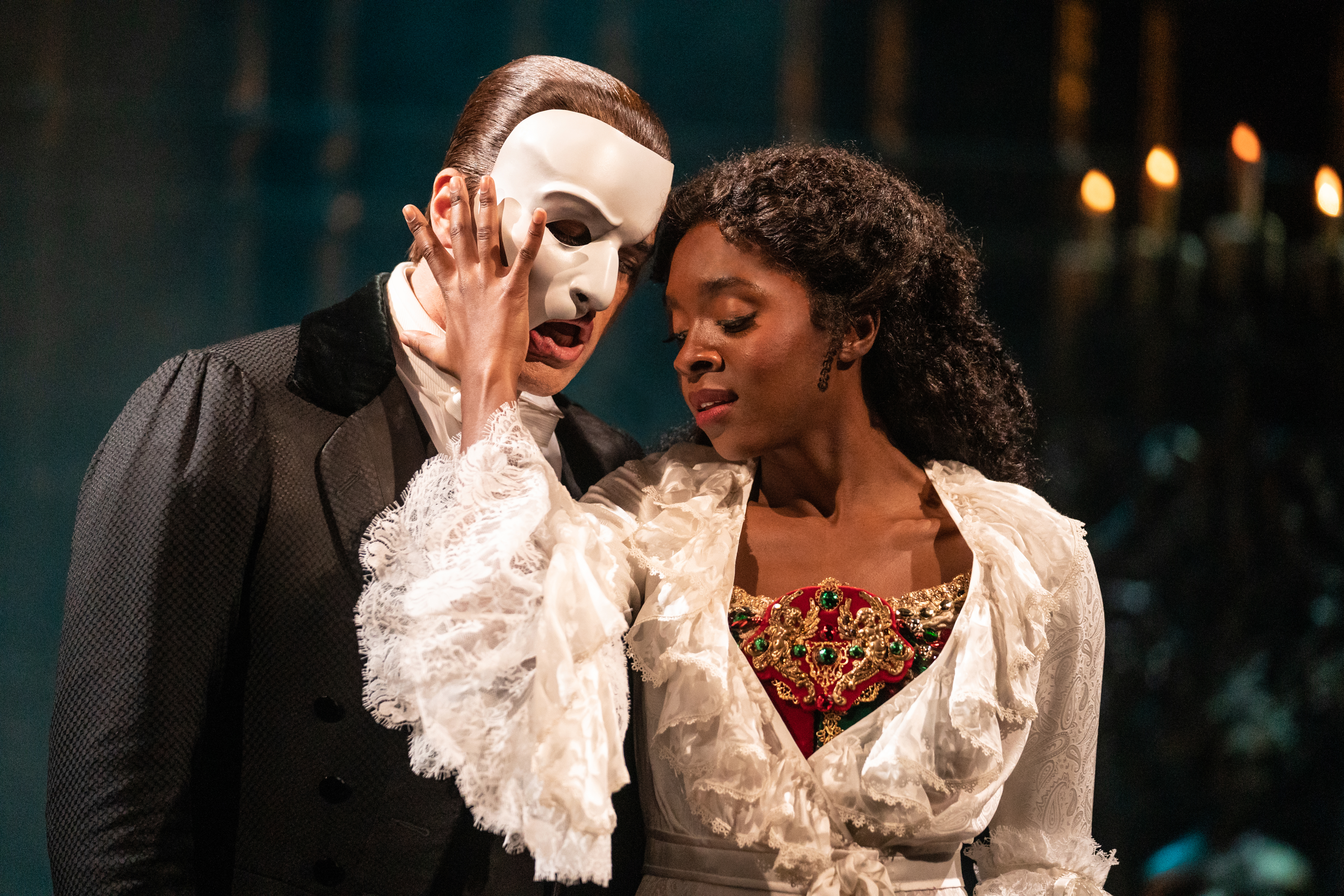 Ben Crawford as The Phantom and Emilie Kouatchou as Christine 